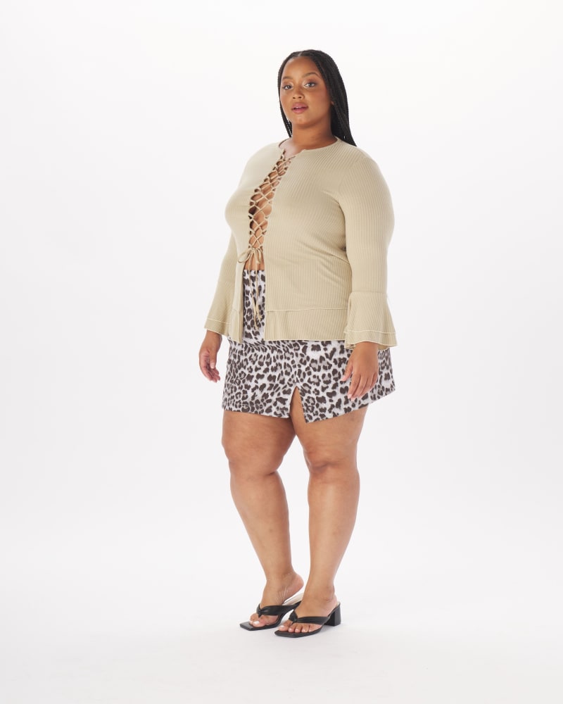 Side of a model wearing a size 2X Atlee Lace-Up Full Length Top in Taupe in Taupe by What Lo Wants. | dia_product_style_image_id:237993